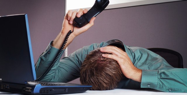 Man going into a coma waiting to get off hold with customer service.