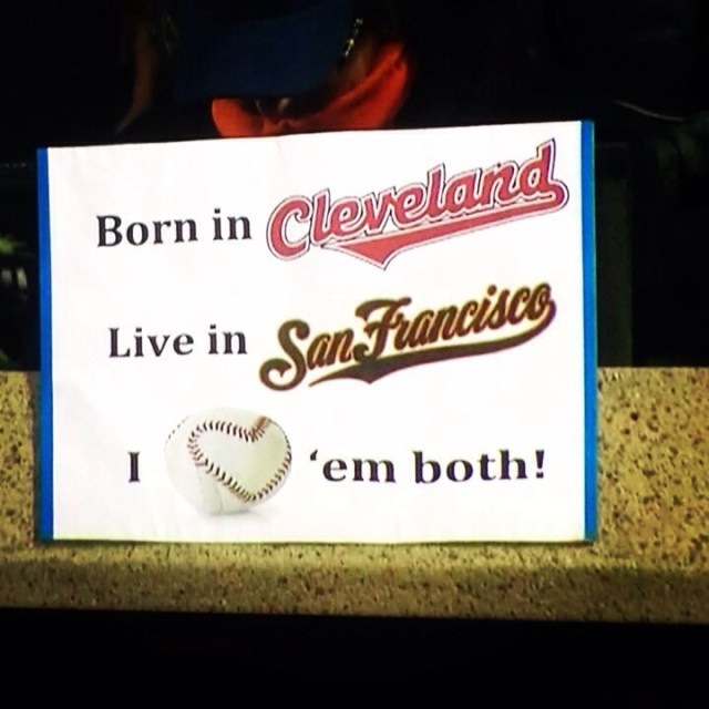 Sign seen at AT&T Park. "Born in Cleveland, Live in San Francisco, Love 'em both!" April 25, 2014.